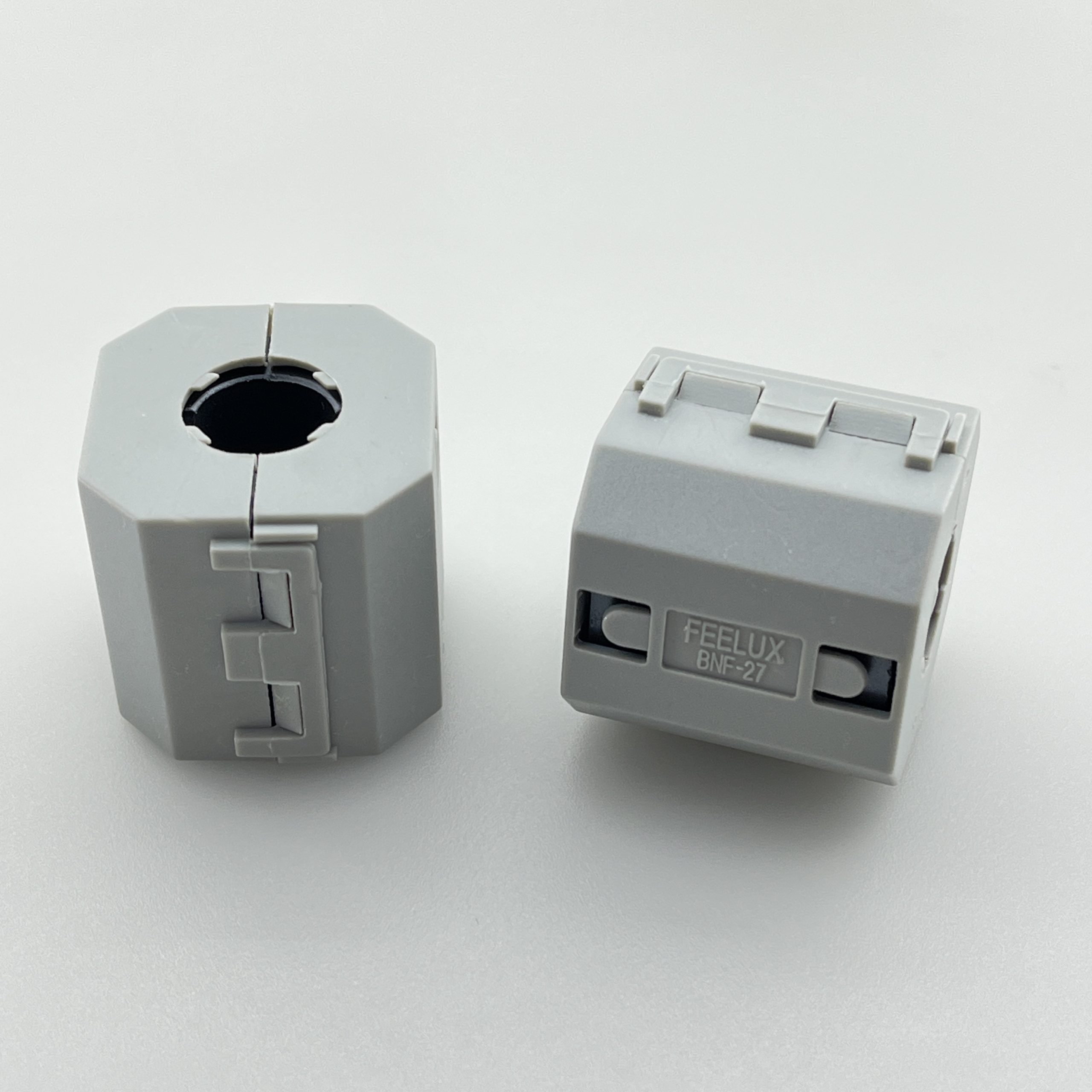 EMI-filter-Feelux-BNF-27_gray نویز گیر کابل EMI با هسته Ferrite مدل BNF-27 - تصویر 1