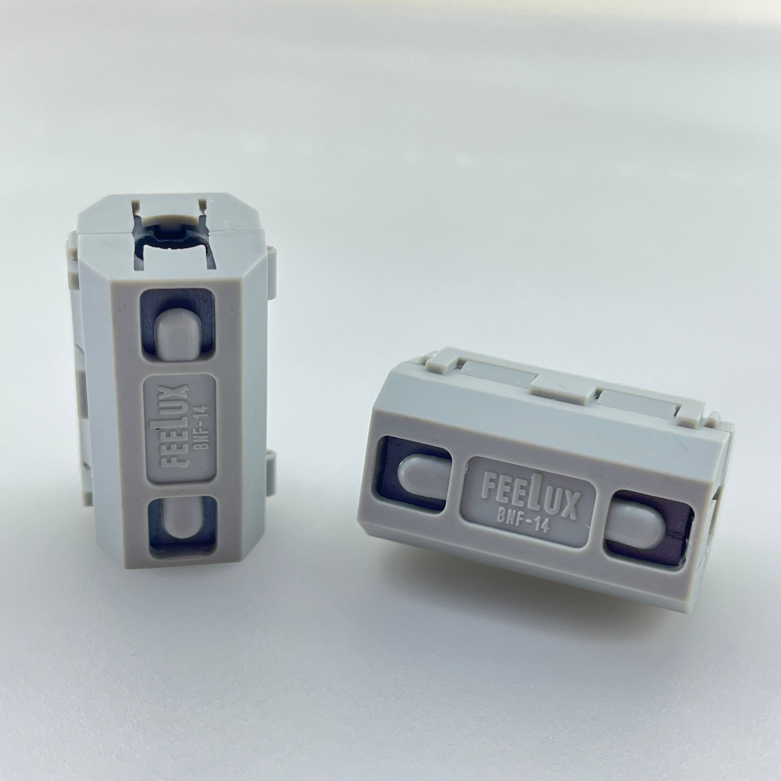EMI-filter-Feelux-BNF_14-gray نویز گیر کابل EMI با هسته Ferrite مدل BNF-14 طوسی - تصویر 1