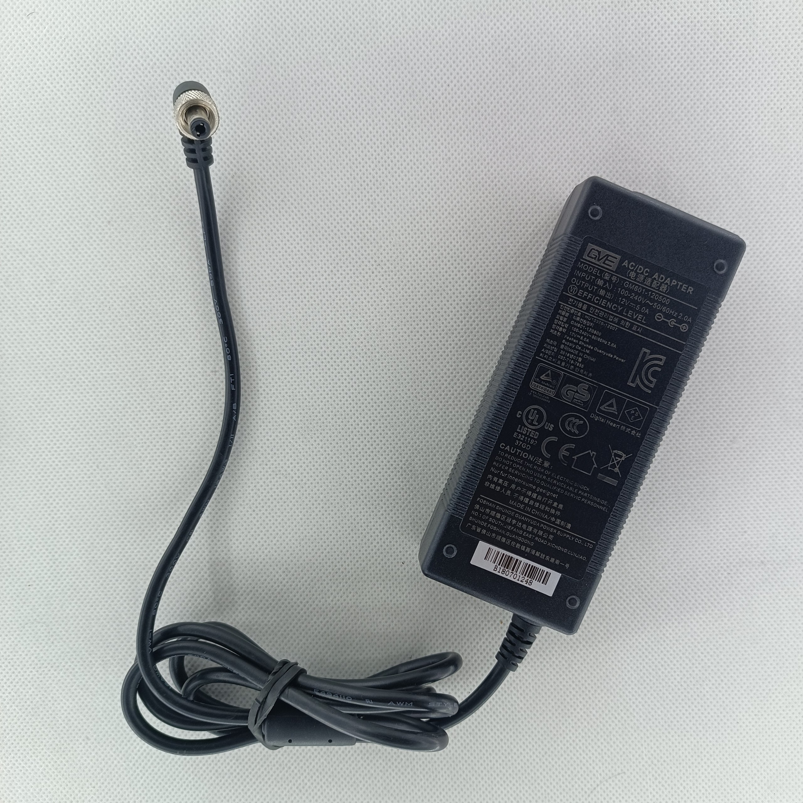 adapter12v-5A-code17-1.jpg آداپتور بین راهی 12 ولت 5 آمپر - تصویر 1
