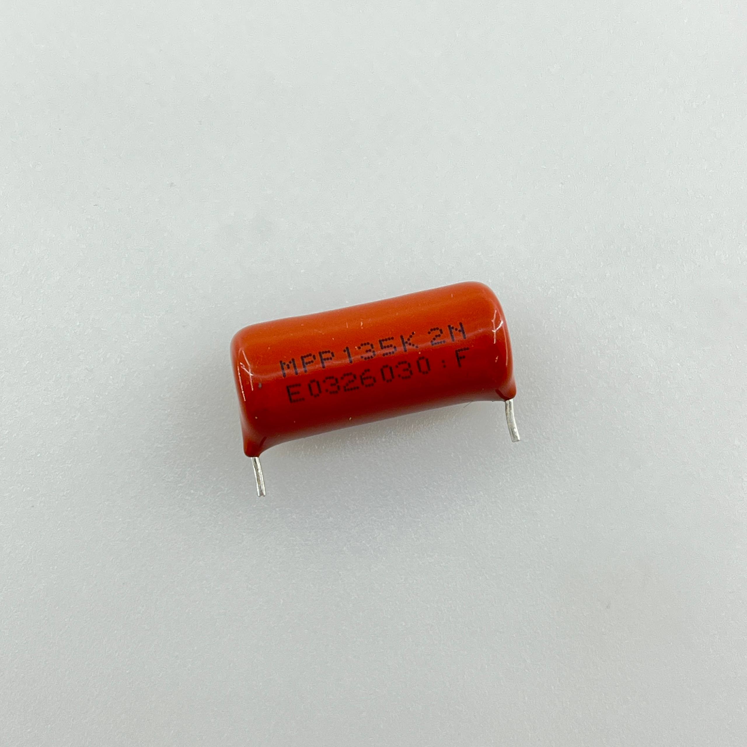 polyester-capacitor-1.3uf-275v-2.jpg خازن پلی استر 1.3 میکروفاراد 275 ولت - تصویر 1