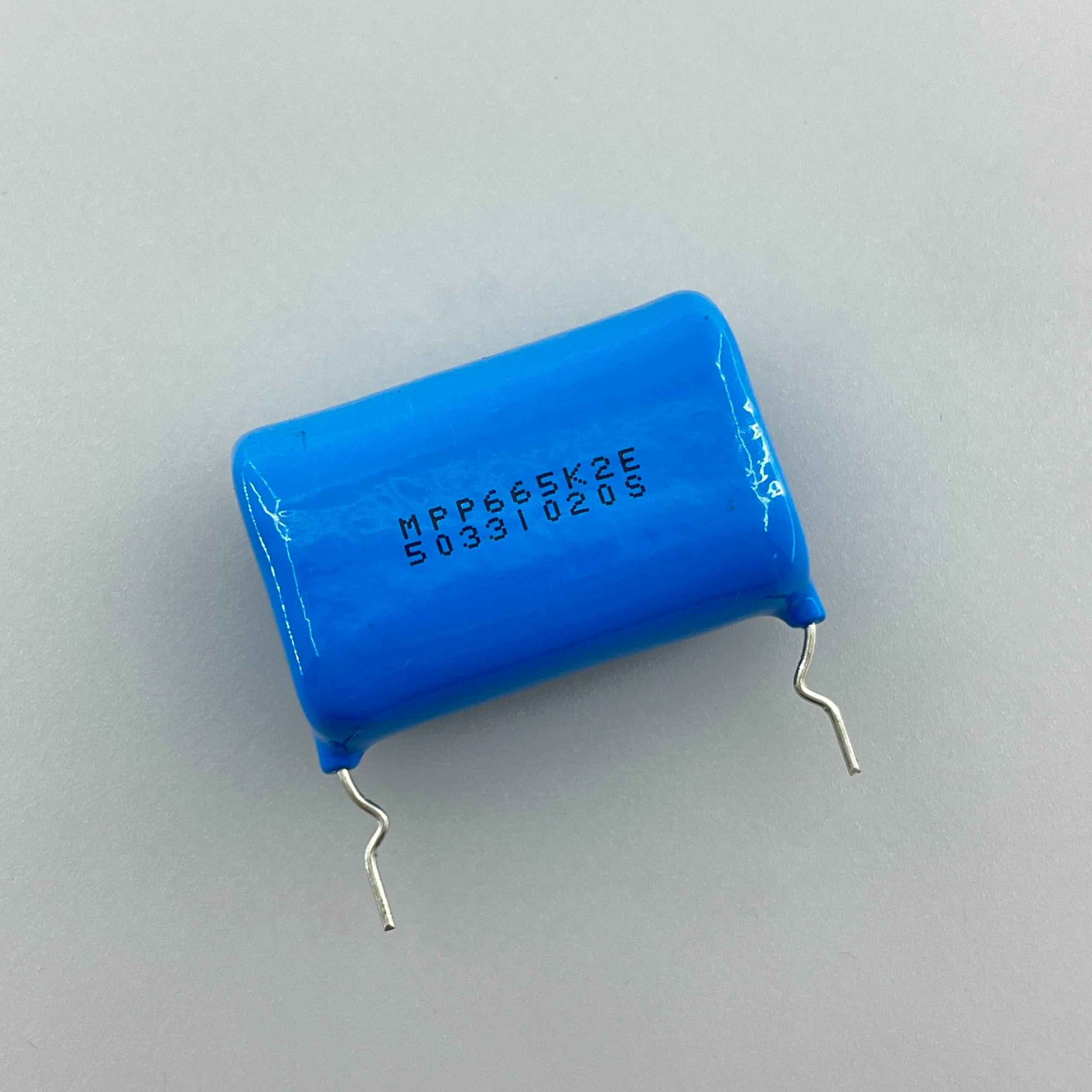 polyester-capacitor-6.6uf-250v-1.jpg خازن پلی استر 6.6 میکروفاراد 250 ولت - تصویر 1